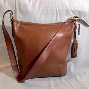 Coach cognac brown leather Val Duffel with Tassels Accent.